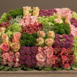 Coussin carré de fleurs pastelles